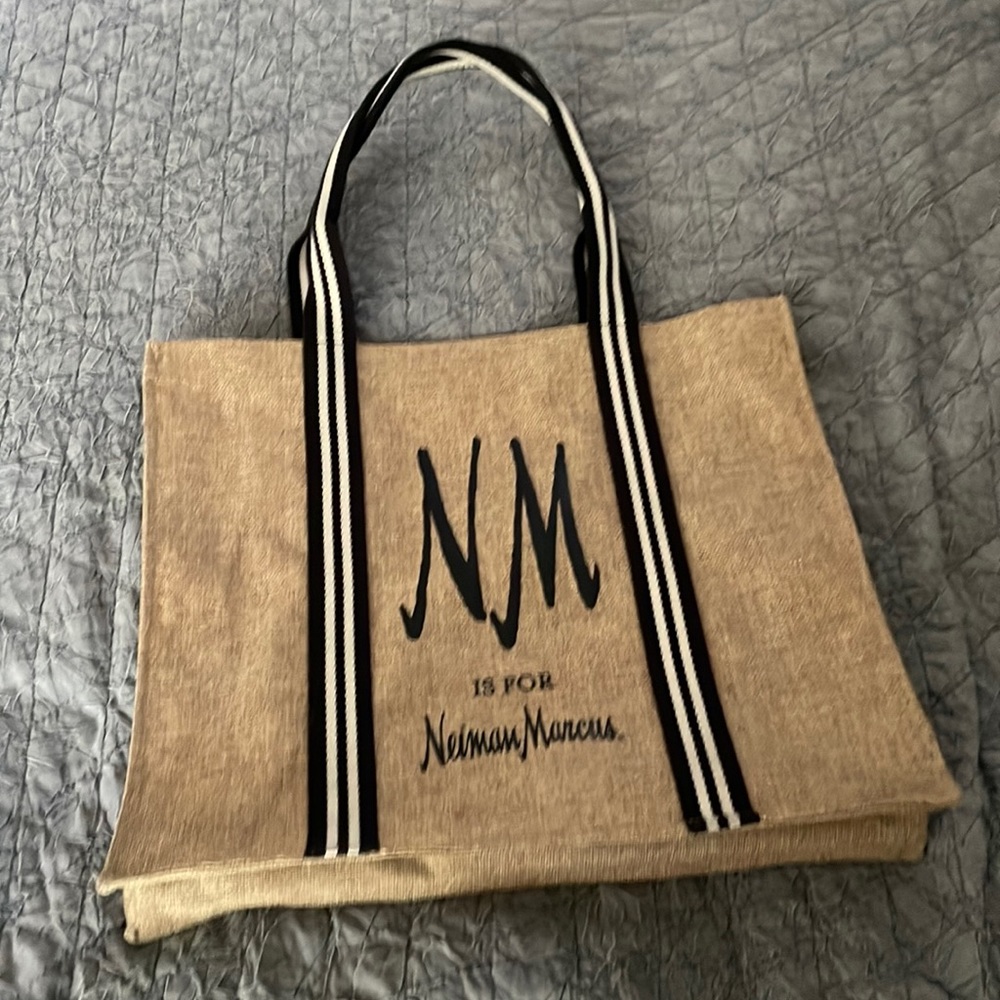 New Neiman Marcus tote. Excellent condition like new. 15 in width by 13 in the